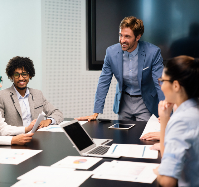 Business team meeting during EAP webinar on employee wellbeing by Quinn Advisory Group